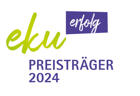 Preisträger eku erfolg 2024: Schriftzug in Grün und Lila